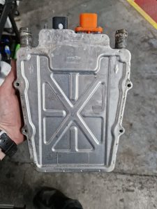 Failed high-voltage coolant heater removed from a Range Rover Evoque PHEV